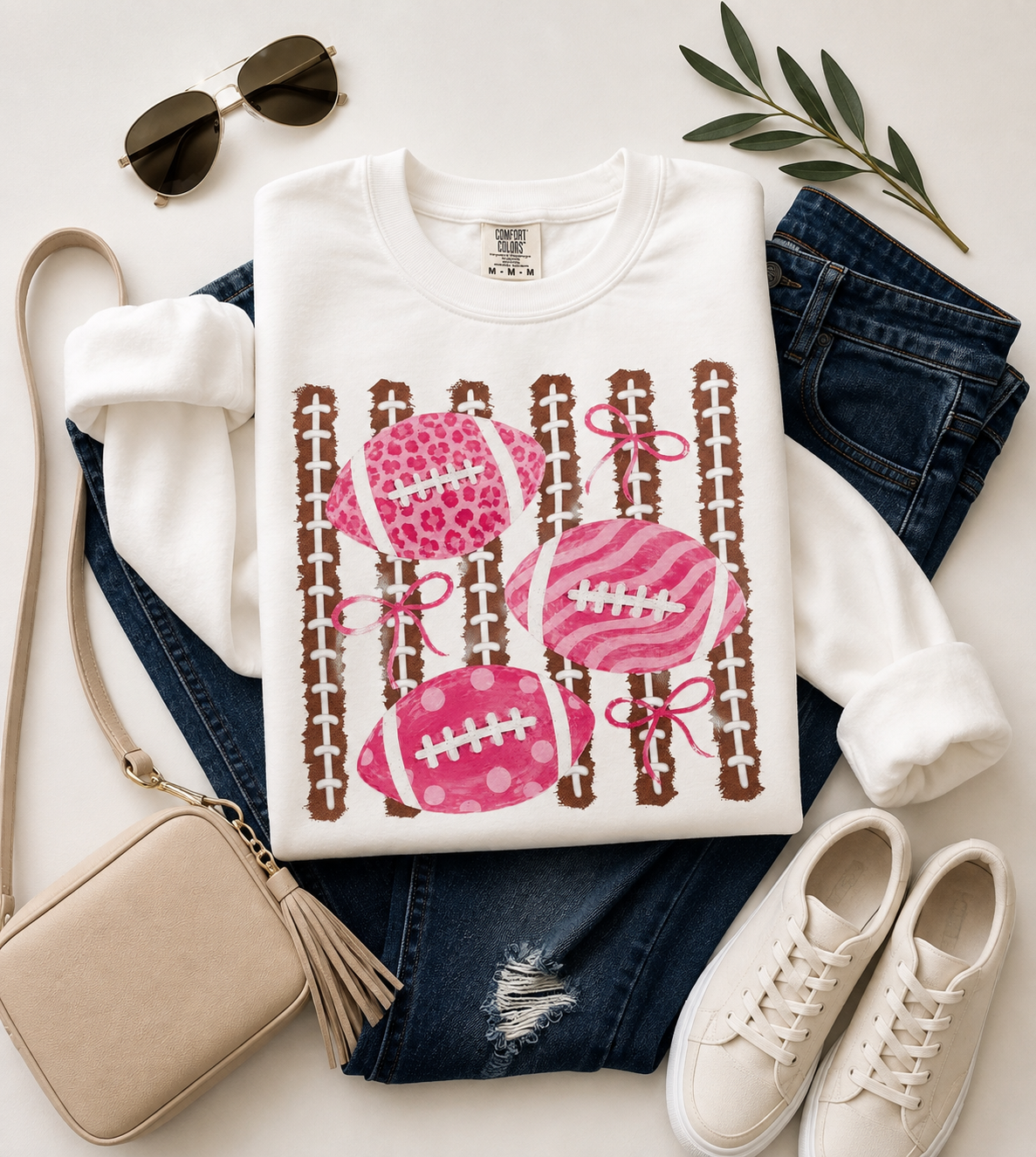 Pink Footballs & Bows Graphic Sweatshirt – White | Free Shipping